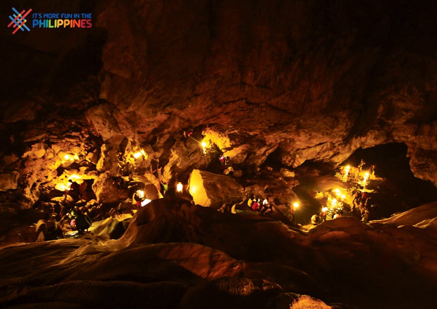 Travelers inside Sumaguing Cave