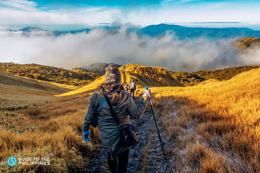 Woman hikes up Mt. Pulag