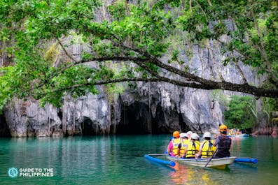 A boat of tourists going inside Puerto Princesa Underground River in Palawan