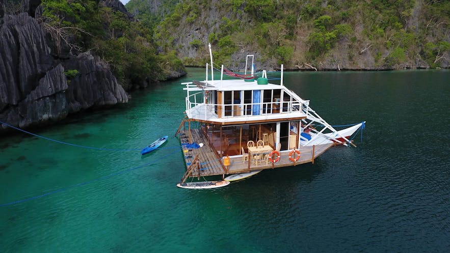 The Paolyn Houseboat in a lagoon in Palawan