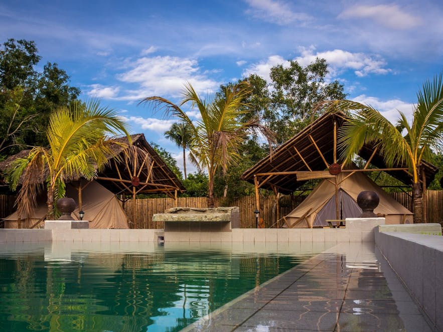Poolside tents of Glamping Alona Resort
