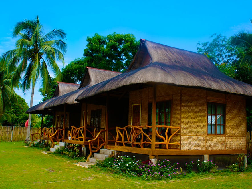 Traditional huts at Jurisu Resort