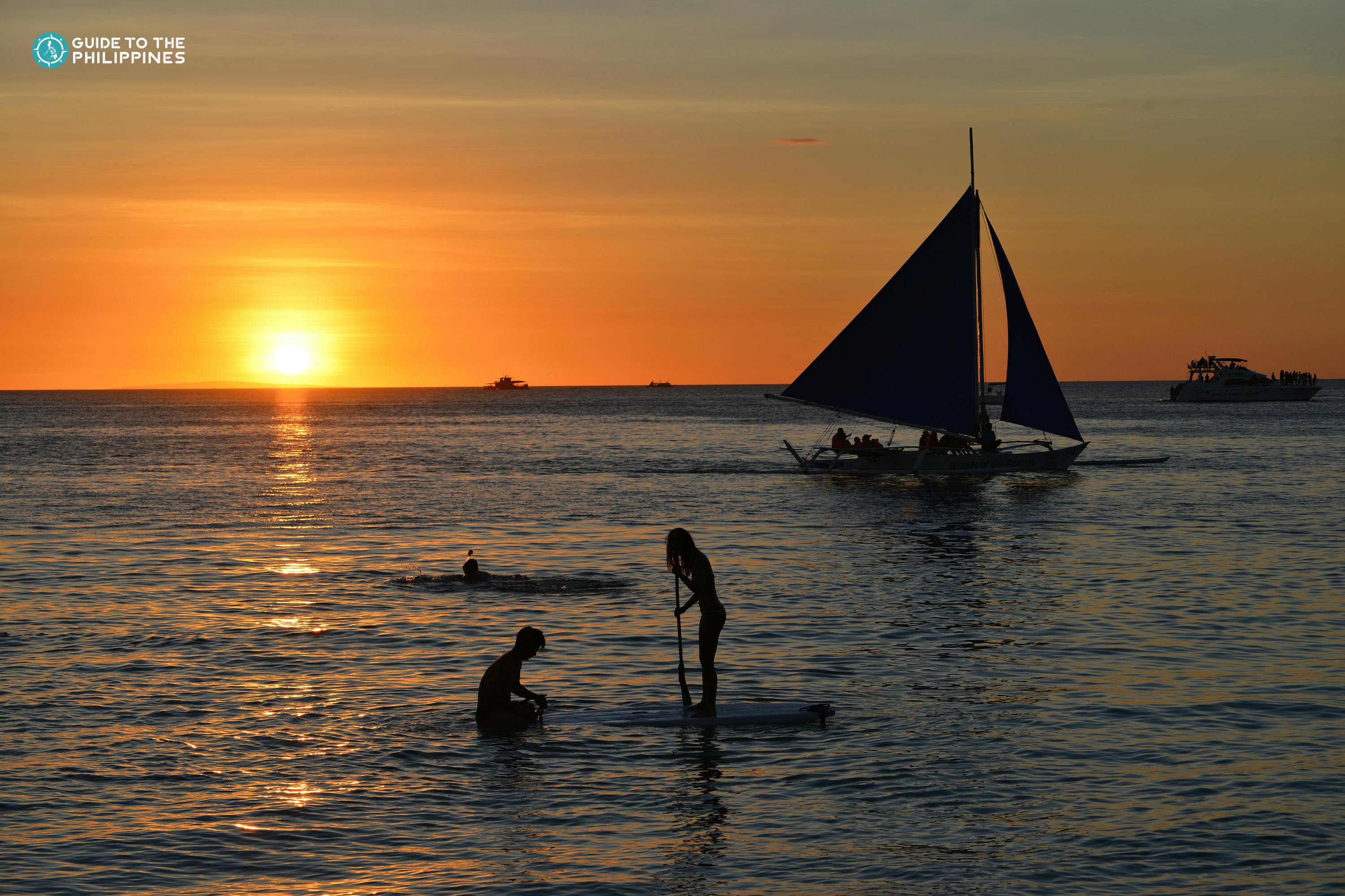 Watch the sunset from White Beach in Boracay Island