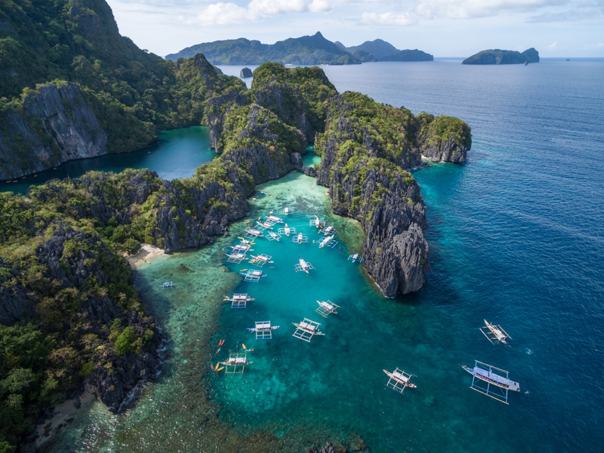 El Nido Catamaran Yacht Island Hopping Tour with Transfer...