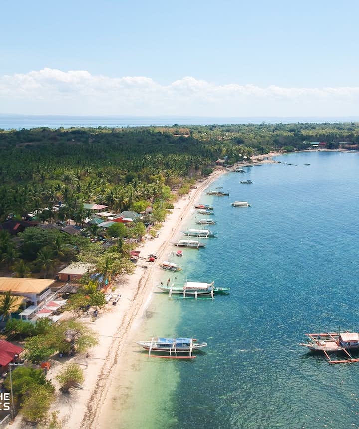 Aerial view of Maniwaya Island's shoreline