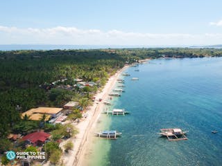 Aerial view of Maniwaya Island's shoreline.jpg