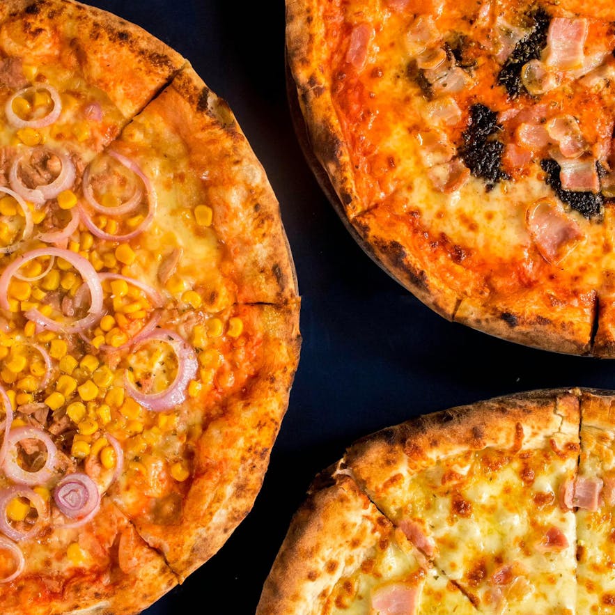 Trattoria Altrove Coron's assorted pizzas