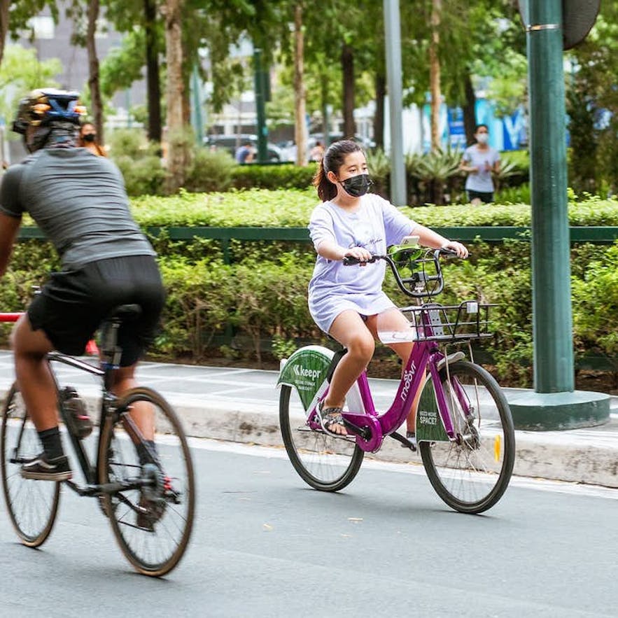 Girl biking in Bonifacio Global City
