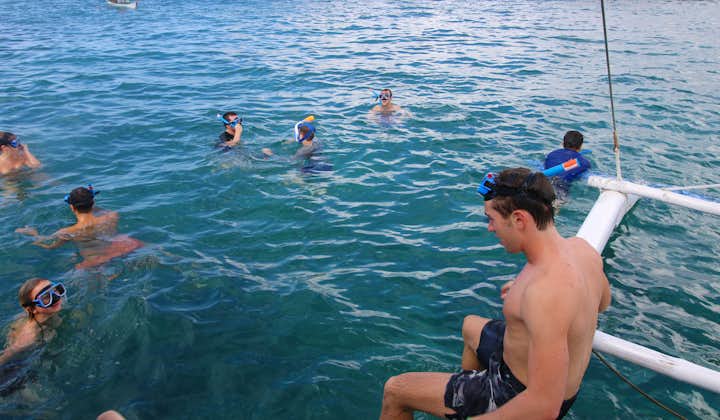 Tourists participating in Snorkeling Activities for the Boracay Island Hopping Private Tour with free Snorkeling Gear