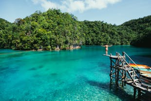 Cliff Diving Activities during the Siargao Island Hopping Shared Tour in Surigao del Norte