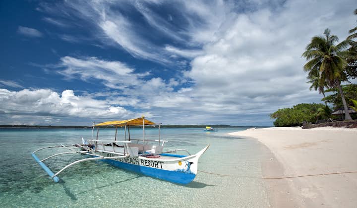 Boat from Marlin's Beach resort seen at the beach front of Bantayan Island in Cebu