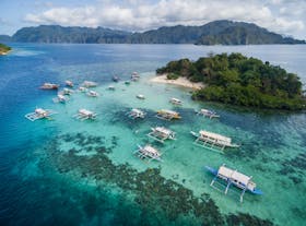 Boats parked at CYC Beach in Coron