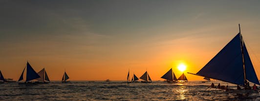 Seize the moment and appreciate the sunset paraw sailing in Boracay Island