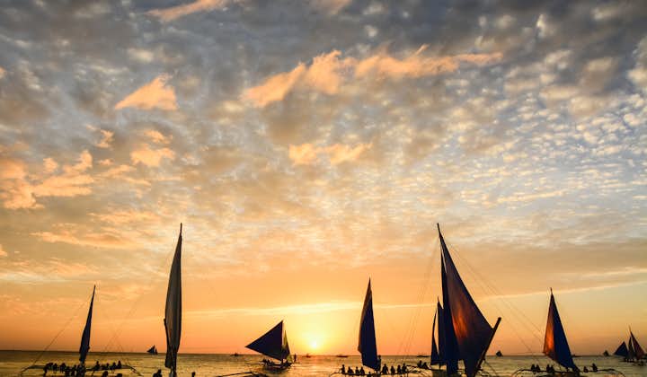 Enjoy Boracay Island's skyline during your sunset paraw sailing