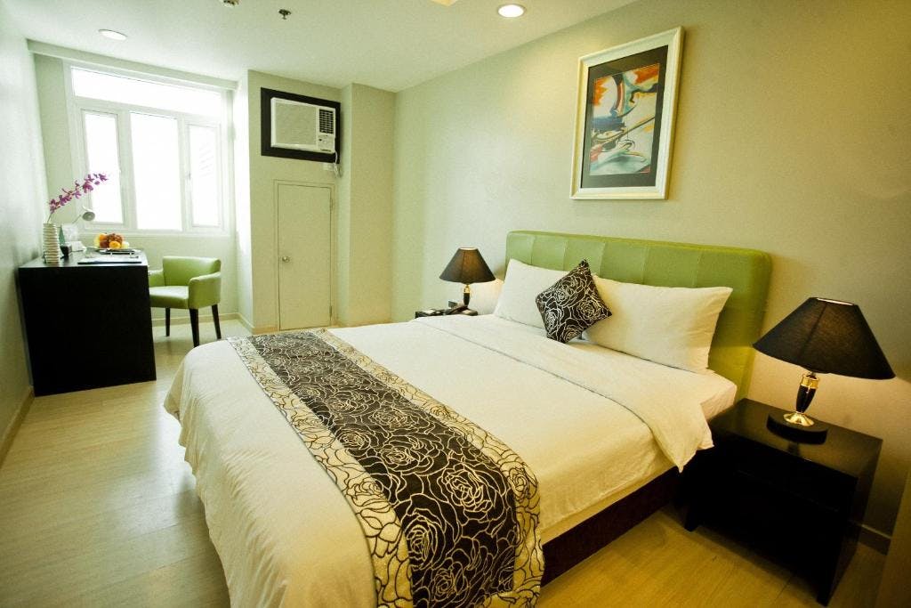 Deluxe Classic Room at The Exchange Regency Residence Hotel Ortigas