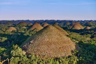 Catch the sunset at Chocolate Hills