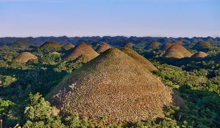 Catch the sunset at Chocolate Hills
