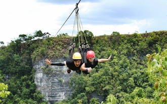 Guests ziplining at Danao Adventure Park