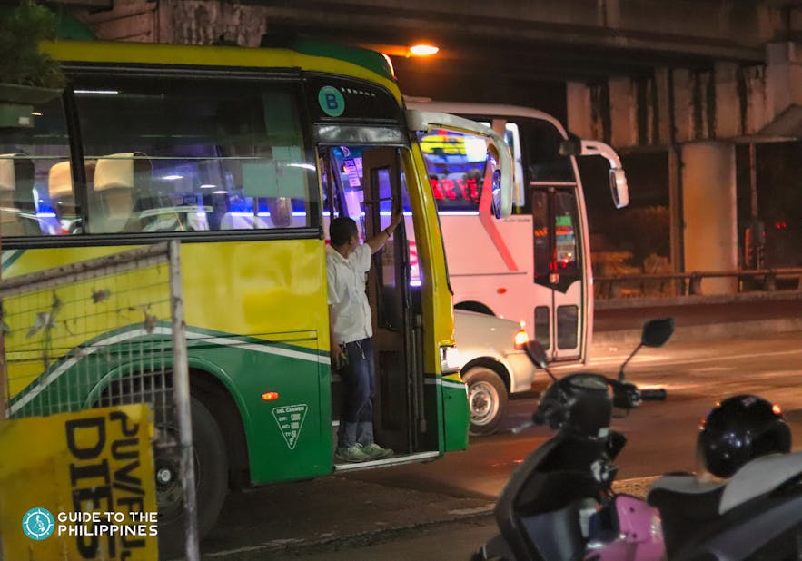 Bus along a busy road in Metro Manila