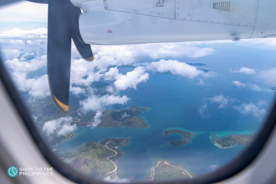 Seaplane flying above Philippine islands