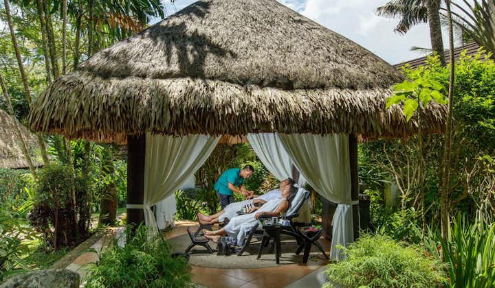 Couple enjoying a tranquil outdoor treatment at Nurture Wellness Village, Tagaytay