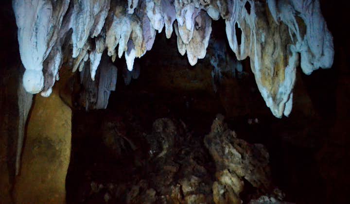 Explore the Pangihan Cave where you can see stalactites, stalagmites, crystals and a plethora of bat.