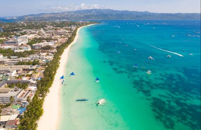 Stroll along the White Beach and Explore Boracay Island before leaving