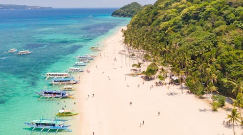 Spend your day exploring beaches and islands around Boracay like Puka Beach and Magic Island