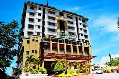 Check in at the Pinnacle Hotel and Suites, Davao