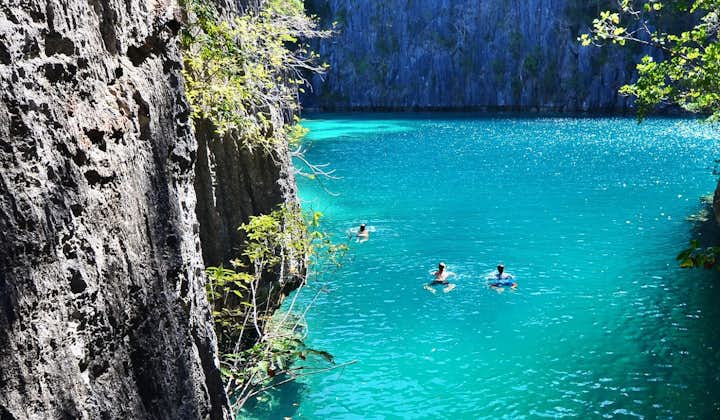 Visit Twin Lagoon in Coron, perfect for swimming and in the most picturesque location for your island hopping.