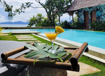 Have a sip of your new favorite drink while chilling at the pool side of Buko Beach Resort El Nido Palawan