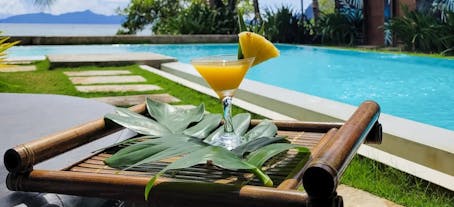 Have your new favorite drink while relaxing your mind at the Buko Beach Resort's pool