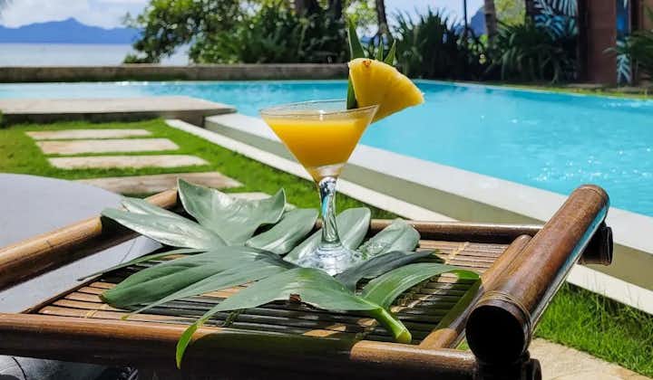 Have your new favorite drink while relaxing your mind at the Buko Beach Resort's pool