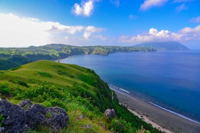 Breathtaking view of Batanes rolling hills and blue sea in South Batan