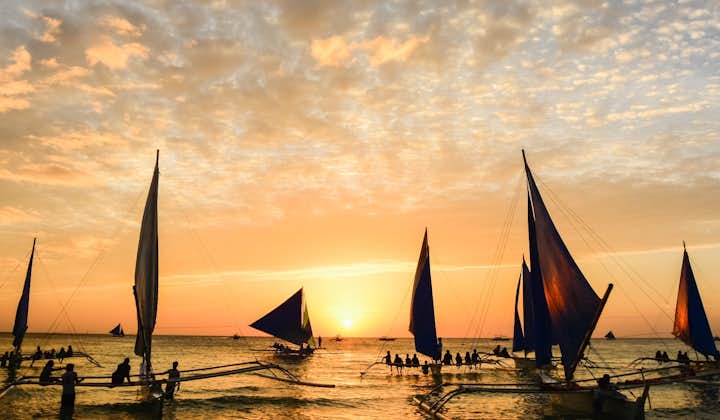 Enjoy Boracay Island's skyline during your sunset paraw sailing