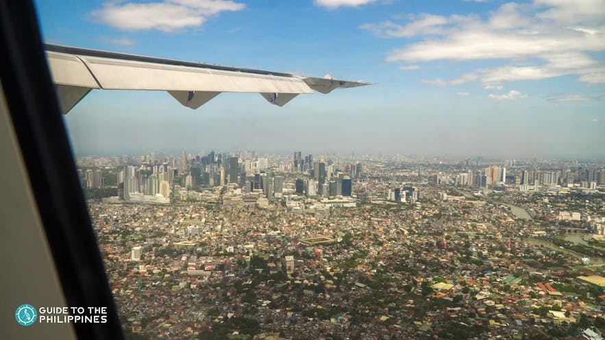 Plane flying over Manila
