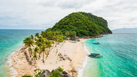 The pristine beach of  Cabugao Gamay Island