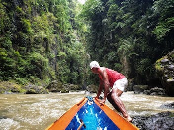Canoe boat ride in the rapids oof Pagsanjan River heading to the falls in Laguna