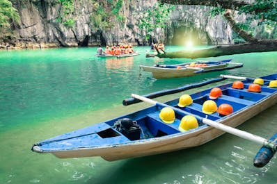 A boat full of travelers about to explore Puerto Princesa Underground River
