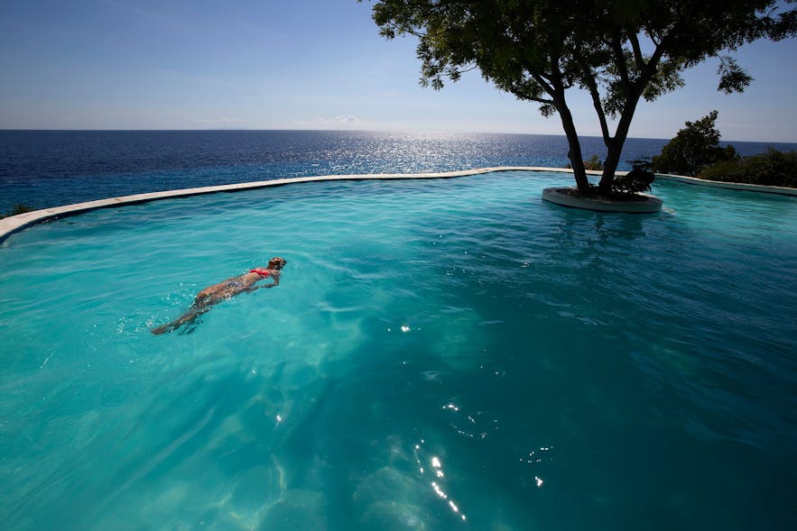 Enjiy a relaxing swim at Bluewater Sumilon Island Resort