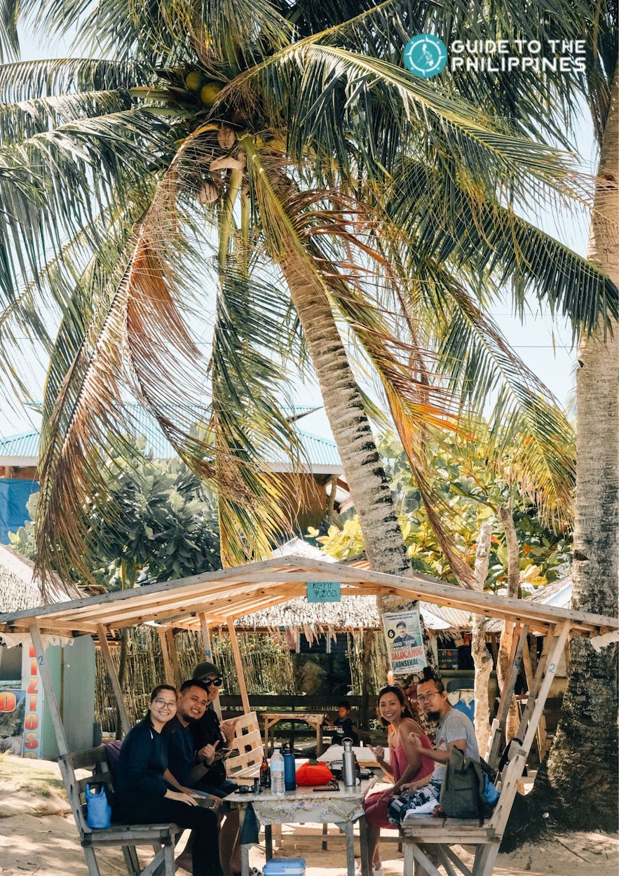 Travelers having lunch at Daku Island Siargao